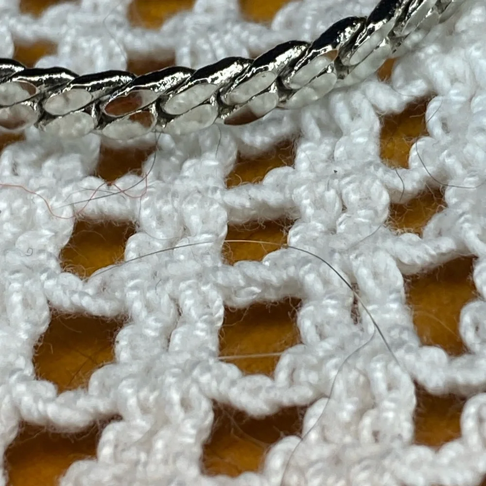 Intricate Silver Beaded Necklace with Symmetrical Design